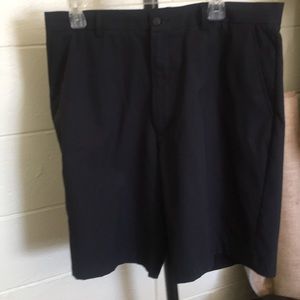 Men’s black golfing shorts.